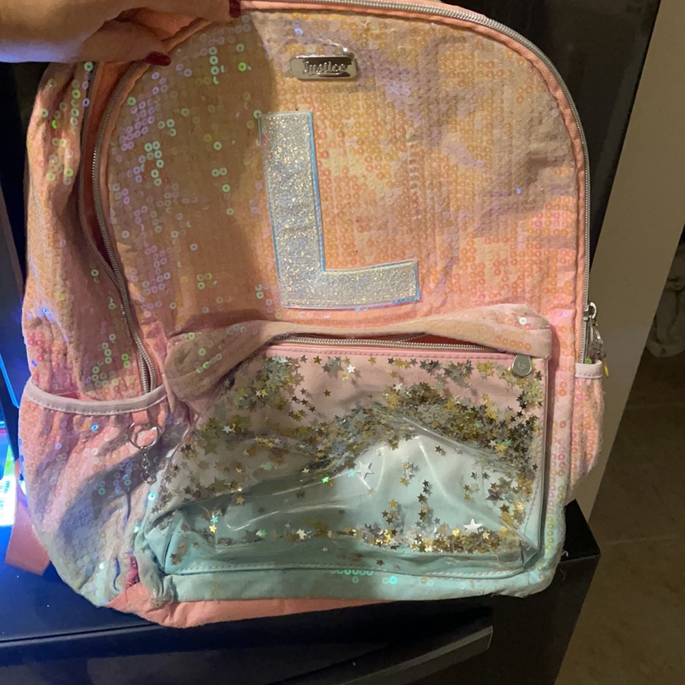 2 lunch bags and a back pack from justice “L”